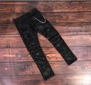Valentino “Provoke” chained denim